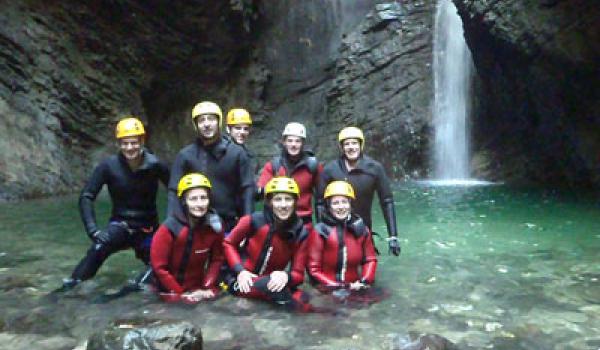 Joanne Kuzma (front center) and group canyoning in Slovenia.