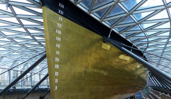 Visitors to the ‘Cutty Sark’ in London’s Greenwich district can walk under the ship, which has been raised 11 feet above her dry dock. Photo by Gretchen Strauch