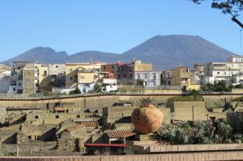 Mount Vesuvius over ancient and modern towns.
