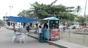 A food stand with table and chairs in central Ixtapa — the busiest place in town. 