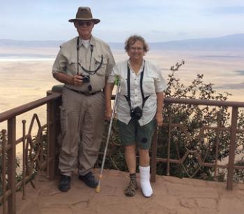 Roger and Libby Cagle with the the Ngorongoro Crater in the background — Tanzania.