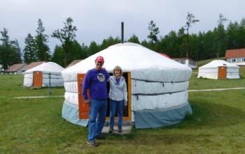 Jim and Sandy Delmonte outside of their ger lodging in Mongolia.