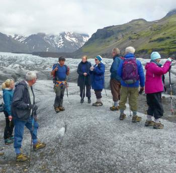 Travelers on a guided glacier walk in Skaftafell National Park — southeastern Iceland.