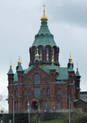 The ornate Eastern Orthodox Uspenski Cathedral, completed in 1868, looms over Helsinki, Finland. 