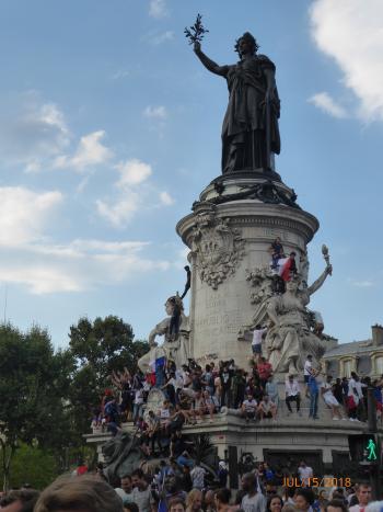 People in Paris' Place de la République celebrating winning the World Cup. Photo by Tom Kilroy