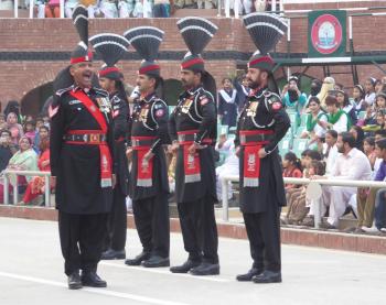 Pakistani soldiers participating in the Wagah Border Flag Lowering Ceremony.