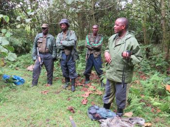 After our hour with the gorillas, our main guide, Fidele (right), and the trackers took a few minutes to talk to us about what we had experienced and to answer our questions. 