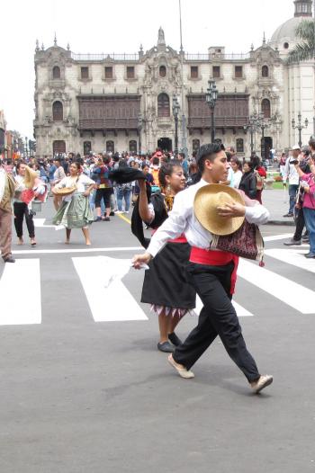 Dancers perform on International Tourism Day in Lima.