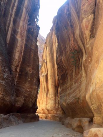 Visitors enter the Petra Valley through the ¾-mile narrow gorge called the Siq.