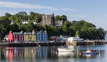 View of Tobermory on the Isle of Mull. The Western Isles Hotel is visible on the hill.