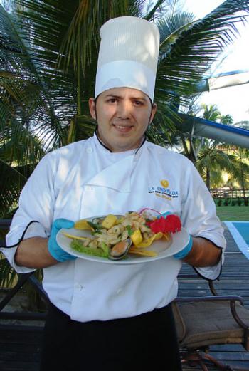 Chef Luis Felipe with Mariscada Teleña — La Ensenada Beach Resort, Tela, Honduras.
