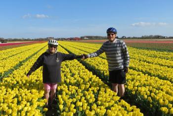 Harvey and Linda Segal in a tulip field near Noordwijk, Holland.