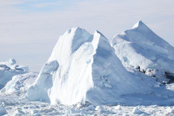 Telephoto shot of a distant iceberg – Ilulissat Icefjord.