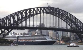 Holland America Line's MS <i>Oosterdam</i> framed by the Sydney Harbour Bridge. Photo by David Selley