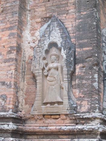 A devata, or female guardian, on one of the Lolei temples. Photo by Julie Skurdenis