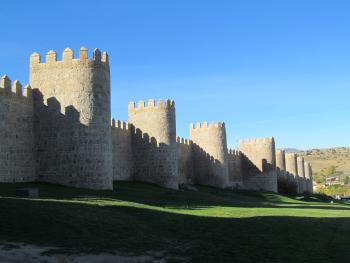 A few of the semicircular towers punctuating the medieval walls of Ávila.