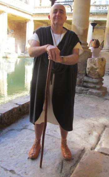 Guide dressed like a Roman at the baths.