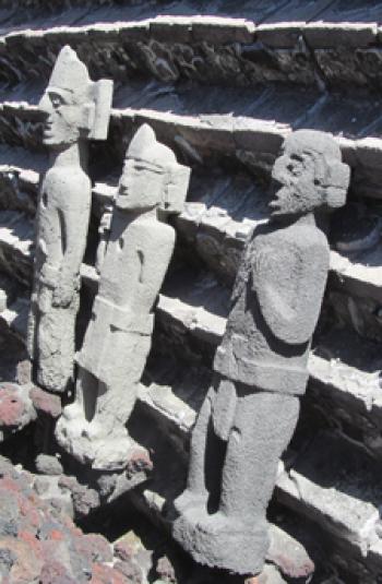 Statues that may have been standard bearers at the base of one of the pyramid "layers" -- Templo Mayor, Mexico City.