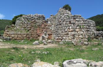 A bastion wall joining two towers at Nuraghe Palmavera in Sardinia, Italy.