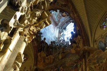 The skylight in the ceiling of the cathedral in Toledo allows light to shine down on the sculpture called “Transparente.”