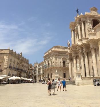 In the main city square of Siracusa, the Cathedral sits beside the Artemision, now a museum. Photo by Fred Steinberg 