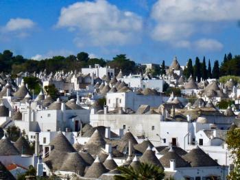 A few <i>trulli</i> are still lived in, but most are now B&Bs or shops — Alberobello.