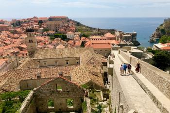 Strolling atop the wall overlooking Dubrovnik. Photo by Trish Feaster