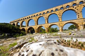 The magnificent Pont du Gard aqueduct was built around 19 BC to provide a reliable water supply to the city of Nîmes, which was then part of the Roman Empire. Photo by Dominic Arizona Bonuccelli