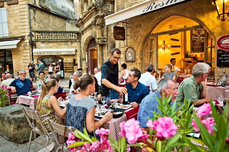 Lingering in outdoor cafes is the norm in France — eat long and well.