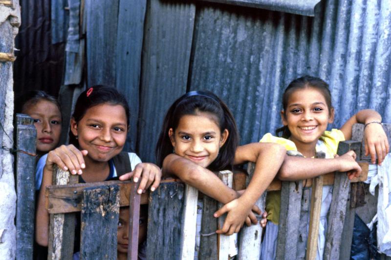 Taking an educational tour often means you’ll visit a struggling part of the world and engage with the locals — like these schoolchildren in El Salvador.