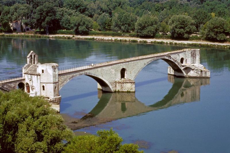 Built in the 12th century, the St. Benezet Bridge lasted until 1668 when a devastating flood took out most of the half-mile-long span. Tourists can pay to walk out on the bridge for a sweeping view of Avignon. Photo by Paul Orcutt