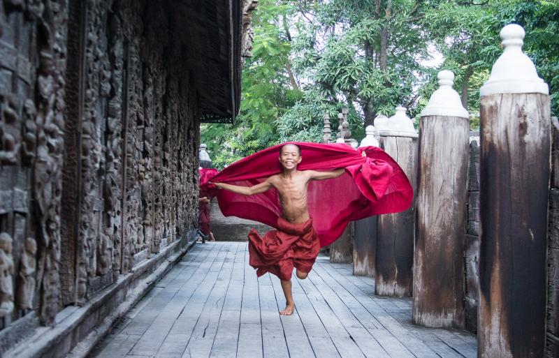 A novice monk modeling for us at Shwenandaw Monastery. Photo by Julie Cassen