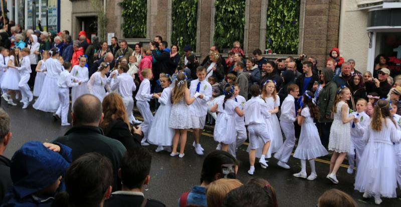 The children’s dance at the Flora Day festival in Helston includes children from the local schools dressed in white.