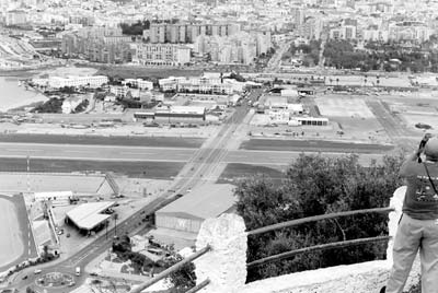 The road from Spain to British-owned Gibraltar crosses the runways of the international airport. Photos: Drake