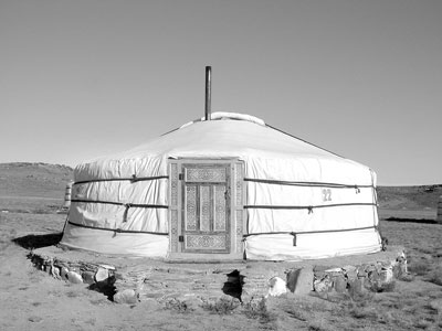 The exterior and interior of our ger at Three Camels Camp.