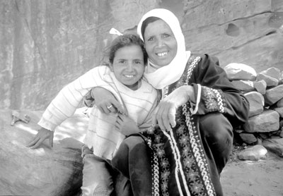 A Bedouin mother and child. About 350 Bedouin families reside near Petra — possibly the descendants of the few Nabataeans who survived as the city faded into history.