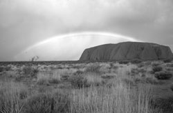 3. A rainbow pointing to Ayers Rock adds drama.