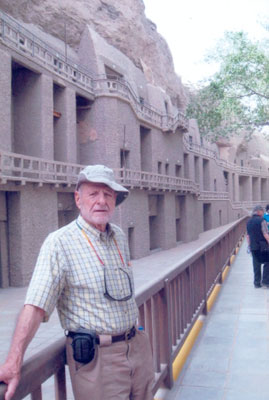 Ed Lifset at the Magao Caves, which house one of the largest collections of Buddhist paintings and sculptures in all of China, some of it more than 1,500 years old. — outside of Dunhuang in Xinjiang Provence, China. Photo by Mary Waters