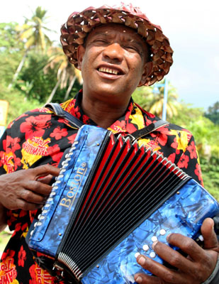 An accordion player welcomes Noordam passengers to the port of Samaná, Domincan Republic. Photo: Toulmin