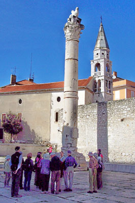 Pictured behind the Pillar of Shame, in Zadar’s historic Old Town, is an ancient Venetian wall and the cathedral tower bell.