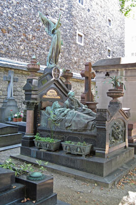 The Pigeon family tomb features the inventor in bed with his wife — Cimetière du Montparnasse, Paris. Photo by Wanda Bahde
