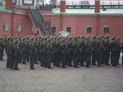 Cadets gather at the Peter and Paul Fortress, the original citadel of St. Petersburg, for the firing of a cannon from the battlement at noon.