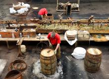 Workers at Scotland’s Speyside Cooperage fashion oak casks for aging Scotch whisky.