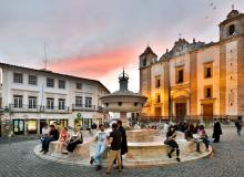 The 16th-century marble fountain, on Evora’s main square, was once an important water source. Now it’s a popular hangout for young and old. Photo by Cameron Hewitt