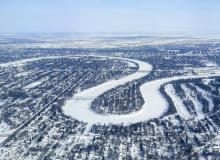 A frozen river winds through Winnipeg.