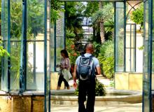 Visitors strolling through the glasshouse in Orto Botanico, Sicily, Italy. Photo by Yvonne Michie Horn