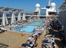 To avoid the worst crowds on a cruise ship, use amenities such as swimming pools during off-peak hours. Photo by Rick Steves