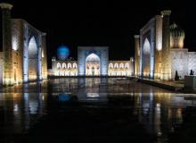 In Samarkand, Uzbekistan, on special occasions, Registan Square is lit at night. Photo by Nick Stooke