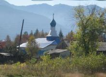 An Eastern Orthodox church in a small farm village in Russia.