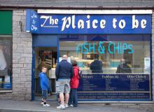 If you need cheap street food in Britain, get take-out from a fish-and-chips shop such as this one in Pitlochry, Scotland. Photo by Dominic Bonuccelli